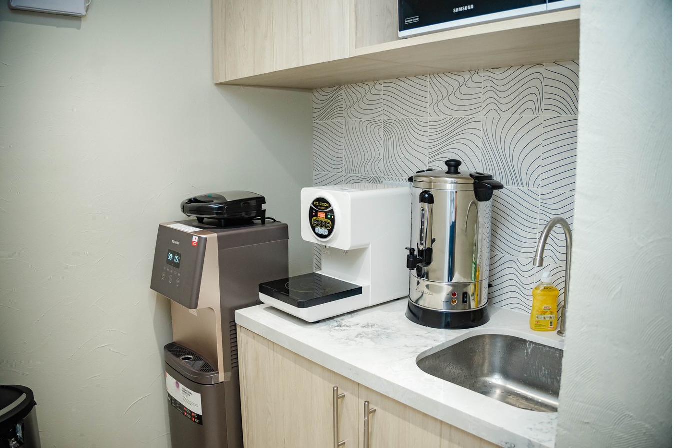Self-service pantry with hot water, induction cooker, and microwave
