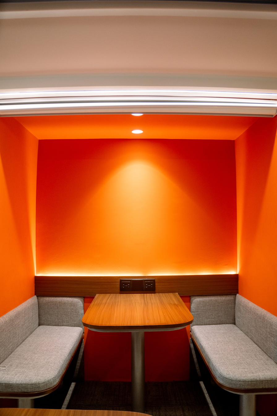 Four-seater orange booth